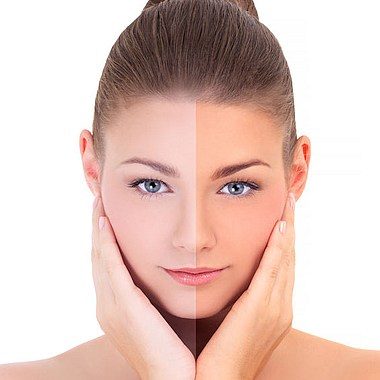 Woman showing her face with a Sunless Tan