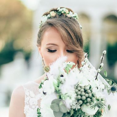 Beautiful bride with updo hairstyle with a floral hair wreath